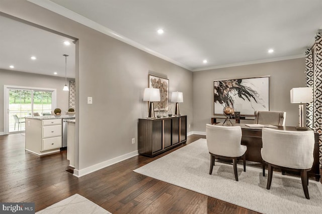 interior space with dark wood-type flooring and ornamental molding