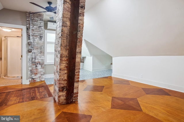 additional living space with ceiling fan and vaulted ceiling