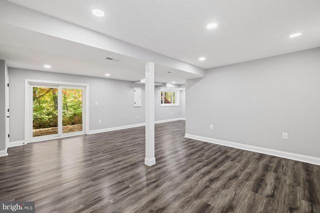 basement featuring dark hardwood / wood-style floors