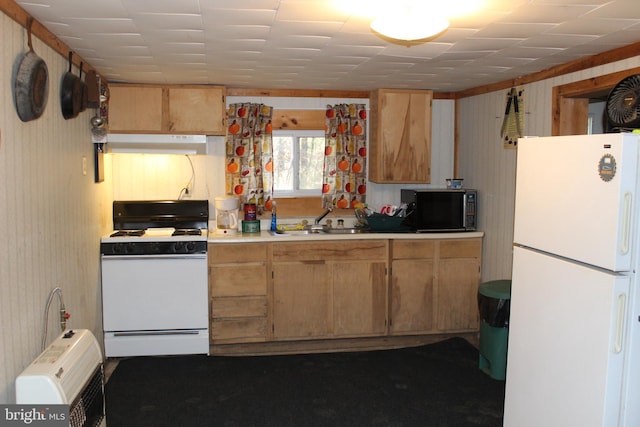 kitchen with white appliances, sink, and light brown cabinets