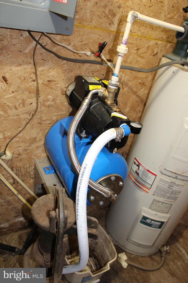 utility room with water heater