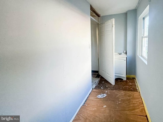 hallway featuring sink