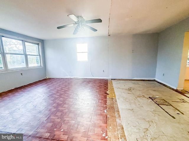 spare room with ceiling fan