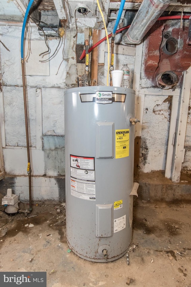 utility room featuring water heater