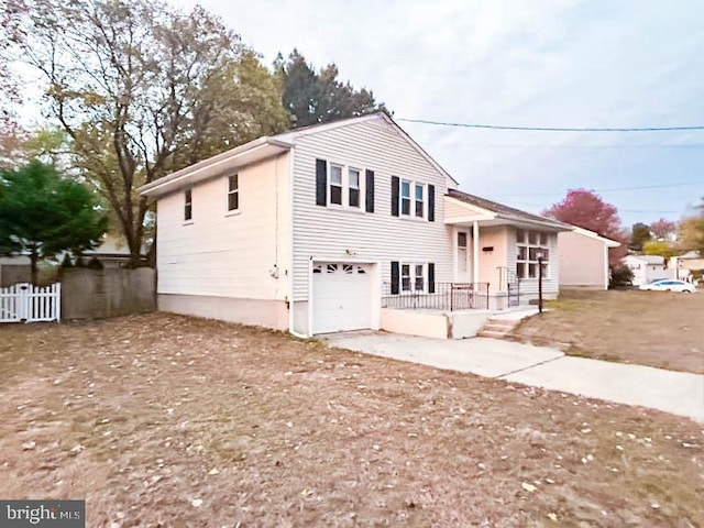 split level home featuring a garage