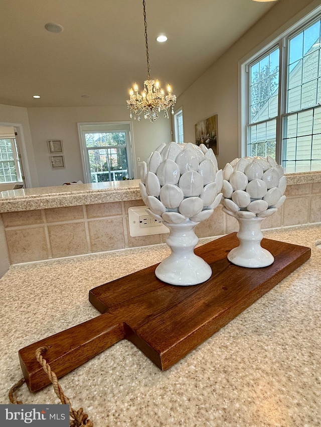 dining area with a notable chandelier