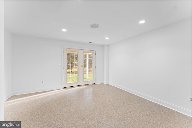 spare room with french doors