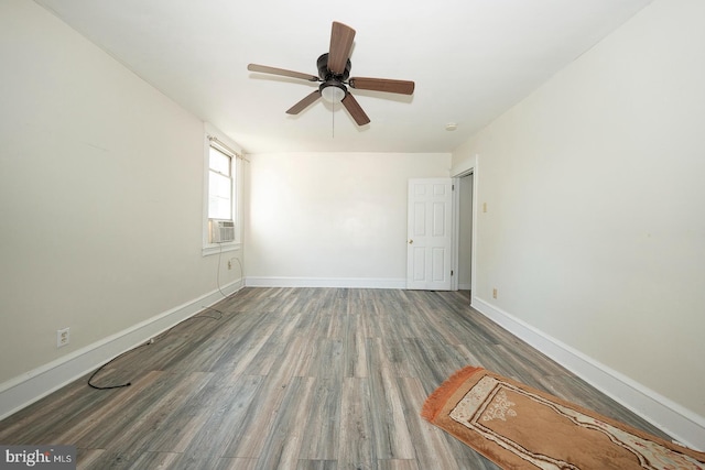 unfurnished bedroom featuring hardwood / wood-style floors and ceiling fan