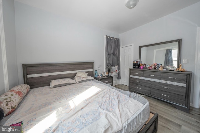 bedroom with light hardwood / wood-style flooring