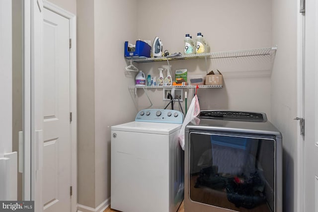 washroom with washer and clothes dryer