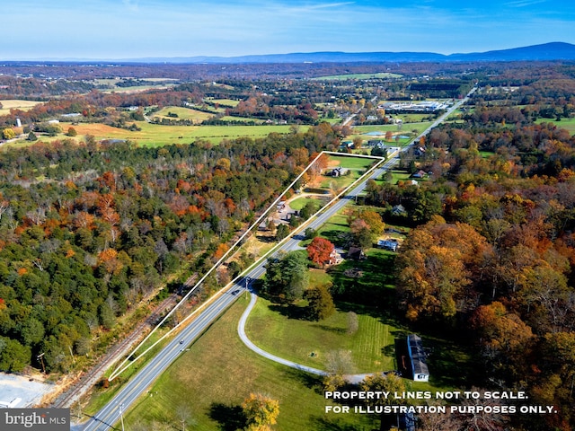 bird's eye view with a mountain view