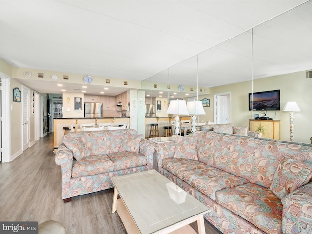 living room with light wood-type flooring