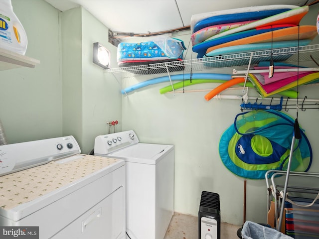11500 Coastal Hwy Unit 103, Ocean City, MD 21842 - laundry room featuring independent washer and dryer