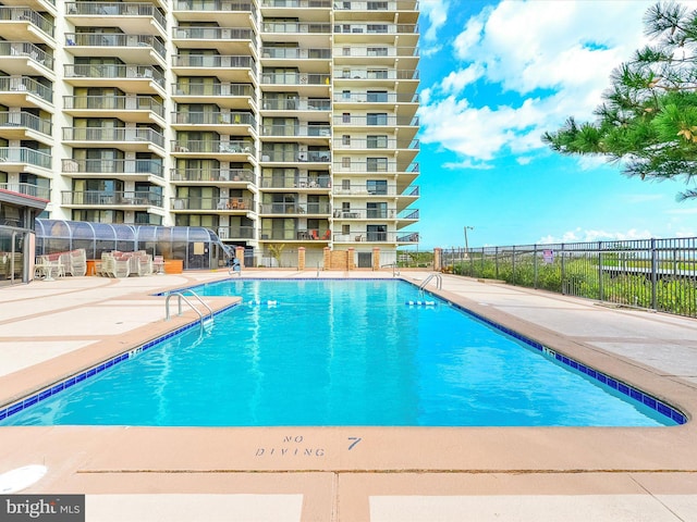 11500 Coastal Hwy Unit 103, Ocean City, MD 21842 - community pool featuring a patio area