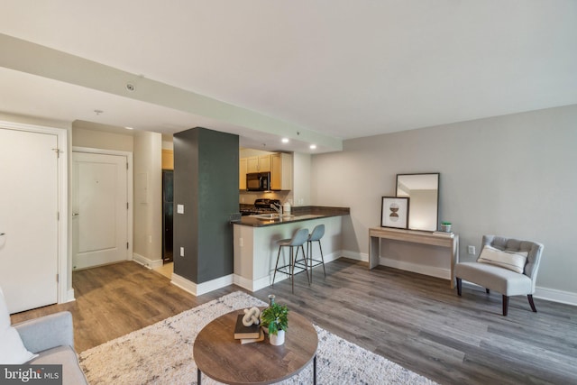 living room with wood-type flooring