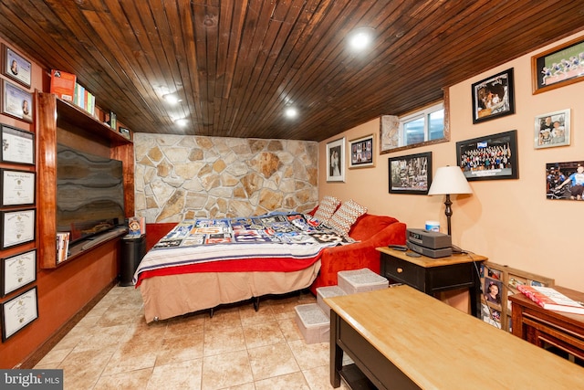 bedroom featuring lofted ceiling, light tile patterned floors, and wood ceiling