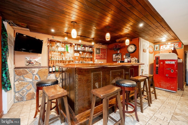 bar featuring wooden ceiling