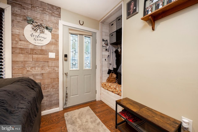 mudroom with dark hardwood / wood-style floors