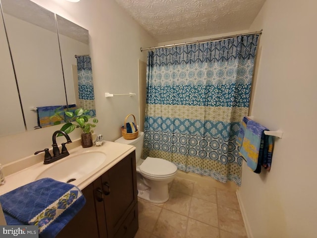 bathroom featuring toilet, vanity, tile patterned floors, a shower with curtain, and a textured ceiling