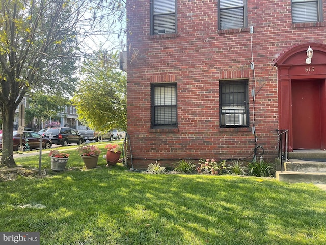 view of home's exterior featuring a yard