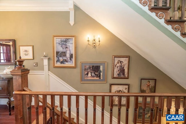 staircase featuring hardwood / wood-style floors and lofted ceiling