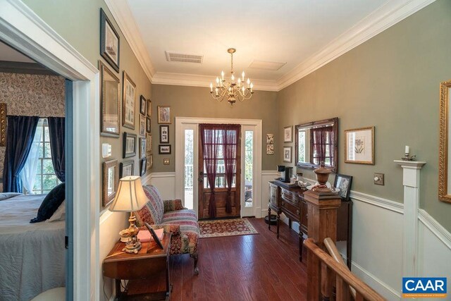 2004 Seven Meadows Ln, Appomattox, VA 24522 - entryway with dark wood-style flooring, a chandelier, ornamental molding, wainscoting, and a decorative wall