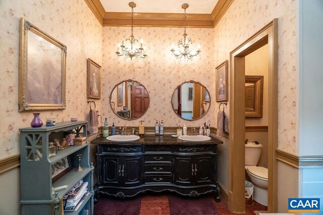 2004 Seven Meadows Ln, Appomattox, VA 24522 - bathroom with wallpapered walls, a chandelier, double vanity, toilet, and crown molding