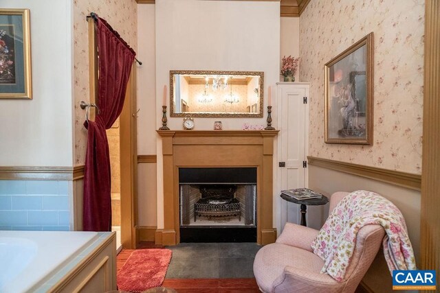 2004 Seven Meadows Ln, Appomattox, VA 24522 - living area with wainscoting, wallpapered walls, and a fireplace