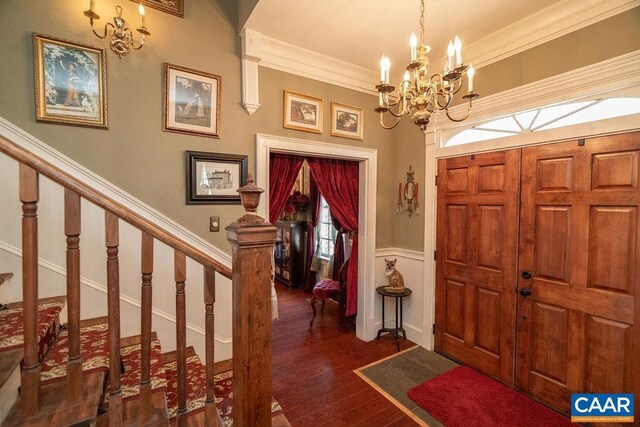 2004 Seven Meadows Ln, Appomattox, VA 24522 - entrance foyer with a chandelier, wood finished floors, wainscoting, stairway, and ornamental molding