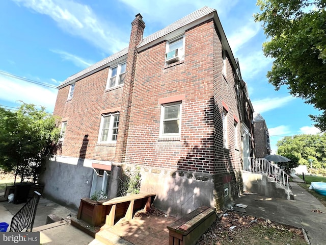 back of house with a patio