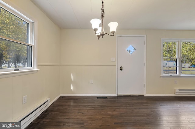 entryway featuring a baseboard heating unit, dark wood-type flooring, and an inviting chandelier