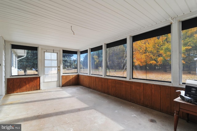 unfurnished sunroom with a wealth of natural light