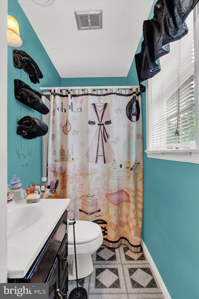 3121 Pineview Dr, Dover, PA 17315 - full bathroom with toilet, visible vents, a shower with shower curtain, tile patterned floors, and vanity
