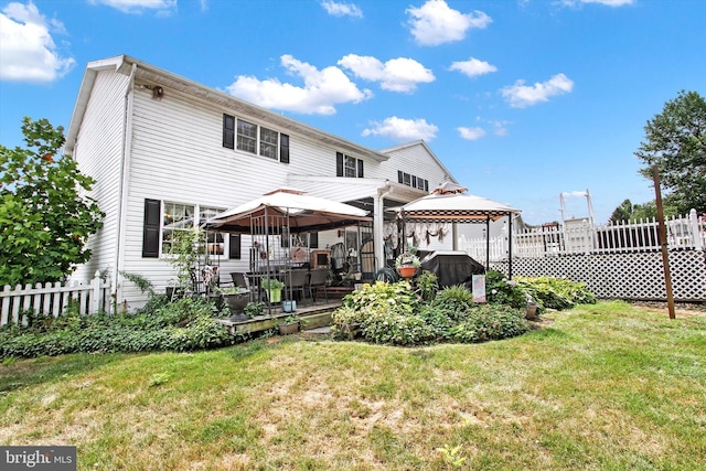 3121 Pineview Dr, Dover, PA 17315 - rear view of house with a lawn, a gazebo, and fence