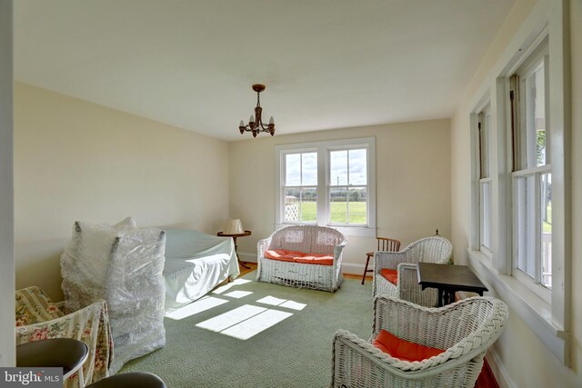 43086 Lucketts Rd, Leesburg, VA 20176 - bedroom with baseboards and a notable chandelier