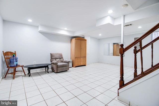 living area featuring light tile patterned floors