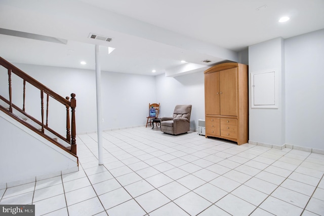 living area with light tile patterned flooring