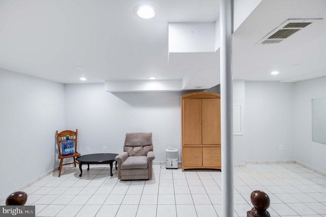 sitting room featuring light tile patterned floors