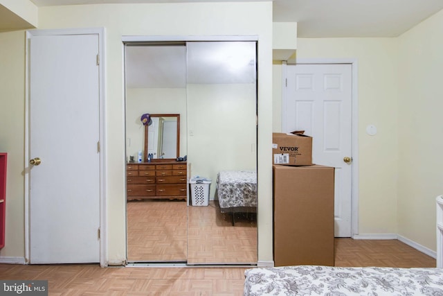 bedroom featuring light parquet floors