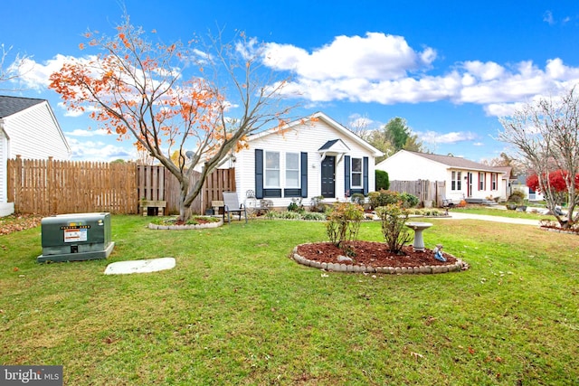 ranch-style house featuring a front lawn