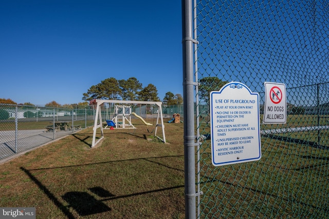 view of play area featuring a yard