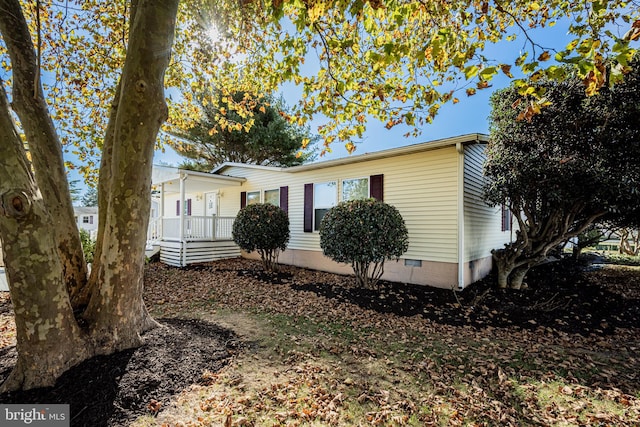 view of front of house featuring a deck