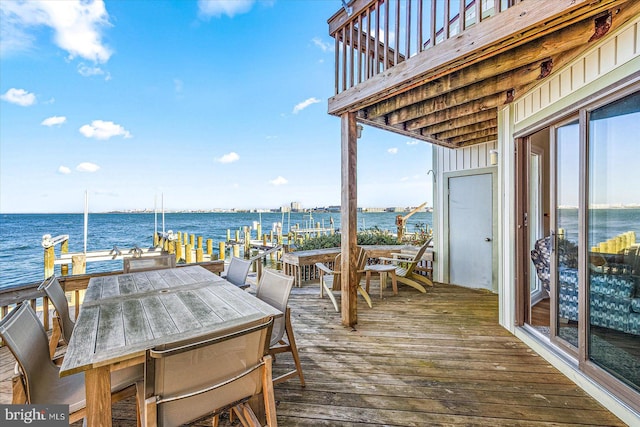 deck featuring a boat dock and a water view