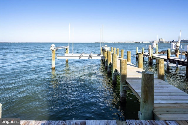 dock area featuring a water view