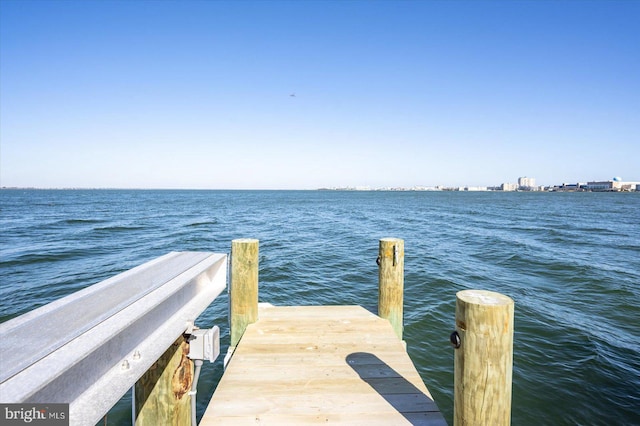 view of dock with a water view