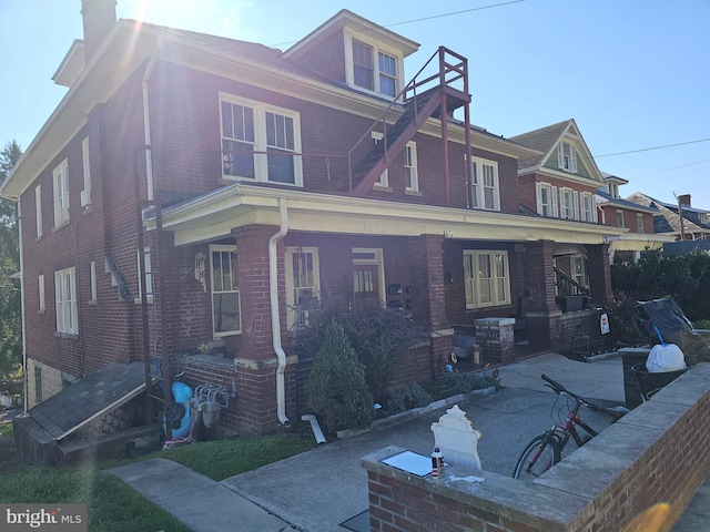 view of front of house with a patio and covered porch