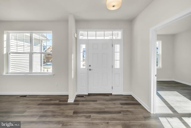 foyer featuring dark hardwood / wood-style flooring