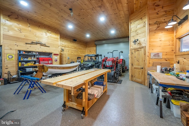 game room featuring wood walls and a workshop area