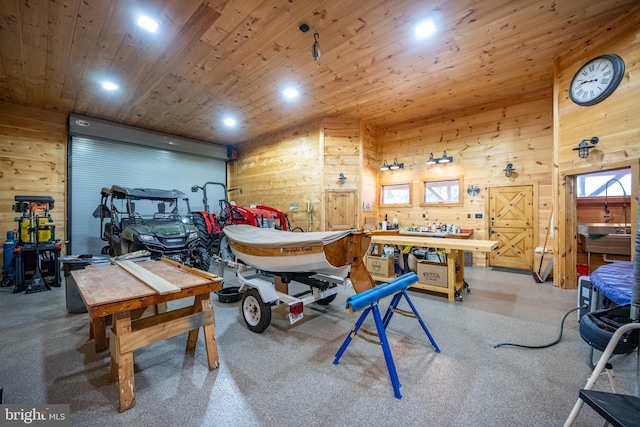 recreation room with a workshop area, wooden walls, and wood ceiling