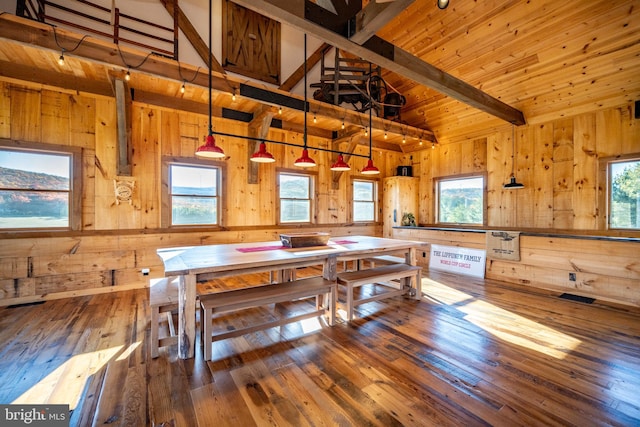 dining space with hardwood / wood-style floors and plenty of natural light